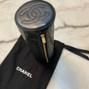 Vintage Chanel Chocolate Bar Pouch in black Lamb Skin from 2002-2003.